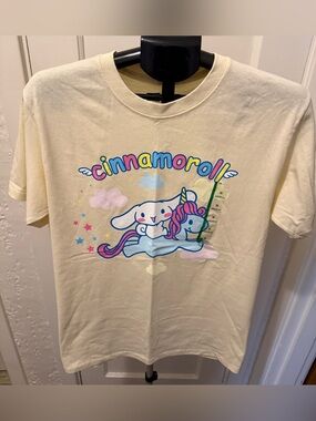 Sanrio Cinnamoroll Cream Tee with Pink & Blue Graphic